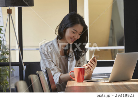 A portrait of a successful business woman working at the office 29319923