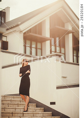 successful businessman in sunglasses full length 29320184