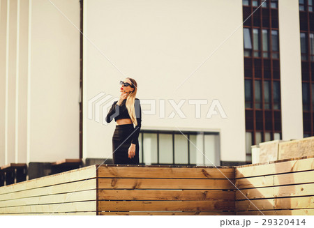 attractive girl stands in the city 29320414