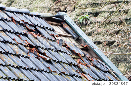 Broken roof of an abandoned farm Broken roof of an abandoned farm 29324347