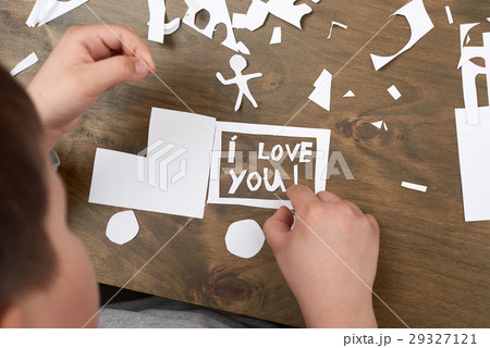 boy makes origami - car and family children parent 29327121