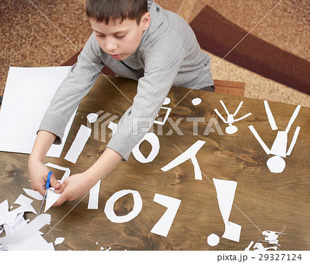 boy makes origami - car and family children parent 29327124