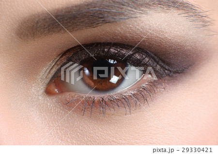 Macro shot of an eye of a woman Macro shot of an eye of a woman 29330421