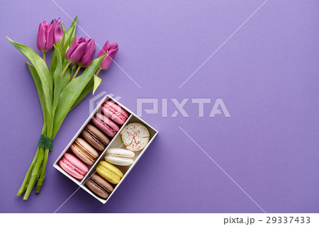 Purple tulips and a box of macarons 29337433