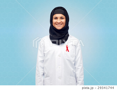 muslim doctor in hijab with red awareness ribbon muslim doctor in hijab with red awareness ribbon 29341744