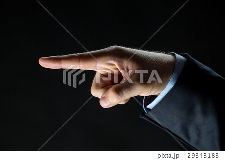 close up of hand pointing finger to something close up of hand pointing finger to something 29343183