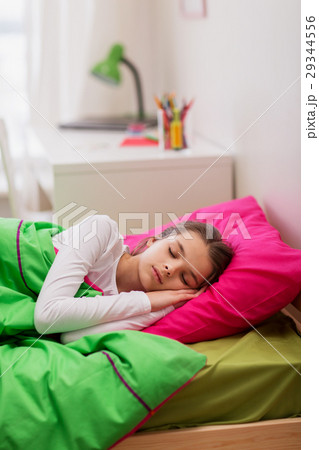 girl sleeping in her bed at home girl sleeping in her bed at home 29344556