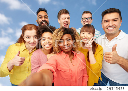 international group of happy people taking selfie 29345423