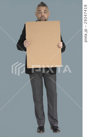 Caucasian Business Man Holding Board 29347419