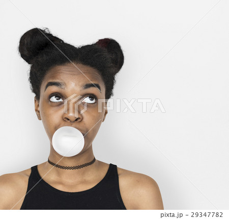 African Woman Blowing Bubble Gum Playful Portrait 29347782
