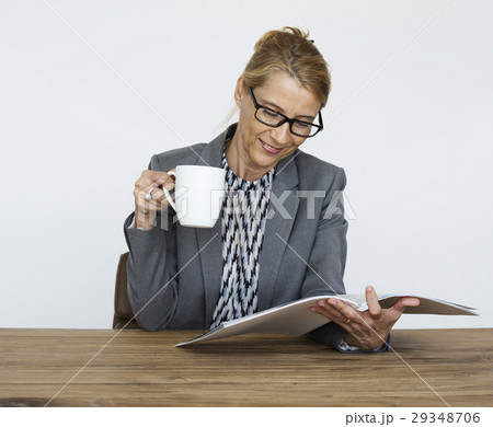 Office Worker Drinking Coffee Reading Book Office Worker Drinking Coffee Reading Book 29348706