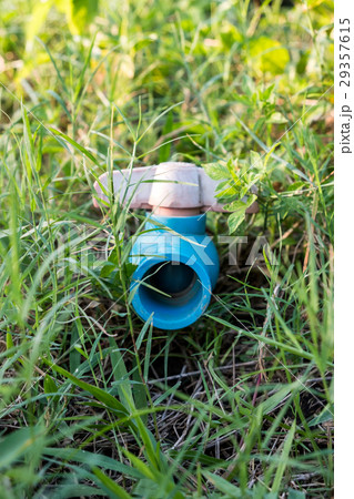 Rural blue water pipe close Rural blue water pipe close 29357615