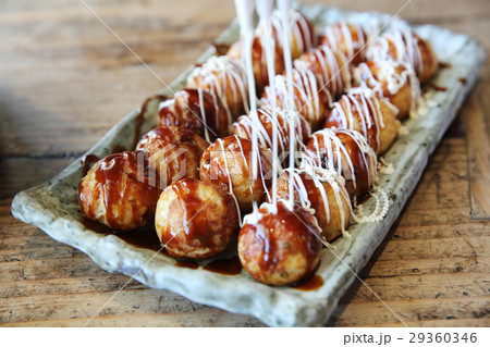Takoyaki on wood background Takoyaki on wood background 29360346