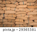 Old hemp sacks stacked in a row. 29365381