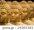 Close-up on head buddha statue, soft focus. 29365383