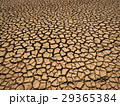 dried and cracked soil in arid season. 29365384