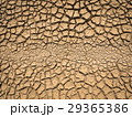 dried and cracked soil in arid season. 29365386