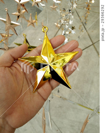 Man Hand and decoration star. 29366292