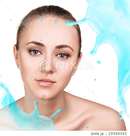 Young woman face in splashes of water. 29368393