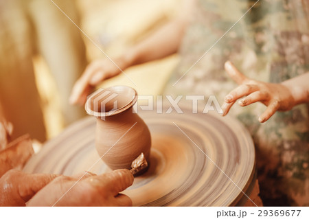 Child learning clay modeling Child learning clay modeling 29369677