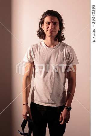 Beautiful romantic man with long hair. 29370298