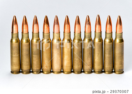 Group several rifle cartridges with reflections Group several rifle cartridges with reflections 29370307