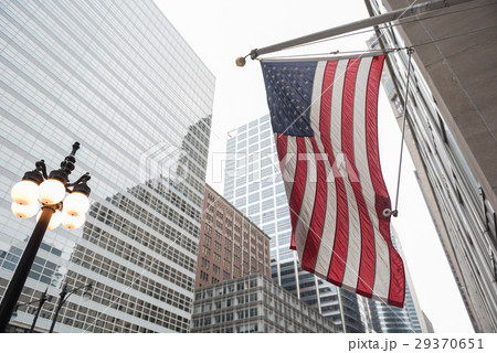 National colors situating in front of tall National colors situating in front of tall 29370651