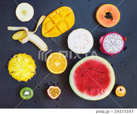 Top View Set Tropical Cut Fruits Black Background 29373397