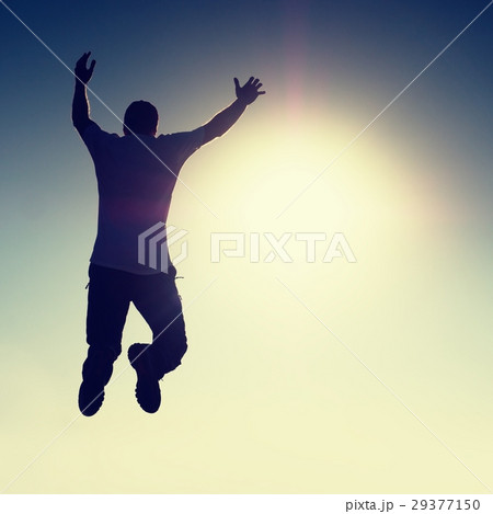 Crazy man is flying.Young man silhouette falling  29377150