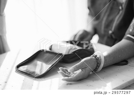 Asian senior woman checking blood pressure bl Asian senior woman checking blood pressure bl 29377297