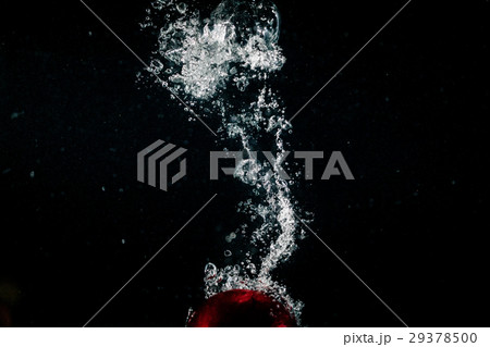 Water splashes over red apple lying on the bottom Water splashes over red apple lying on the bottom 29378500