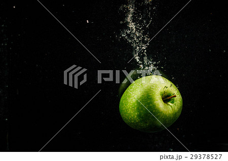 Sparkling green apple splashes water  Sparkling green apple splashes water  29378527
