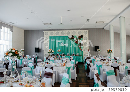 White restaurant hall decorated with green cloth White restaurant hall decorated with green cloth 29379050