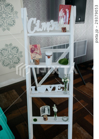 White shelves with wooden letterings 'Love' White shelves with wooden letterings 'Love' 29379053