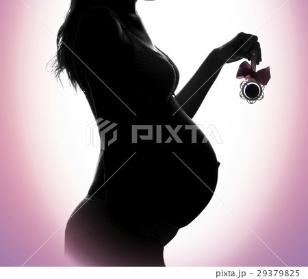 Pregnant woman silhouette on a pink background 29379825