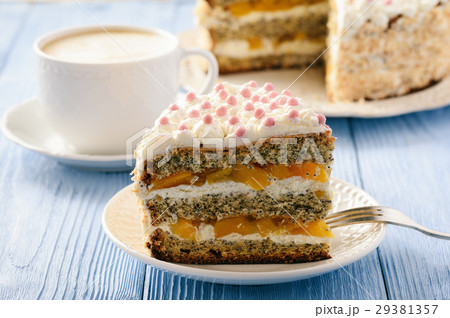 Homemade bisuit cake with whipped cream and peache 29381357