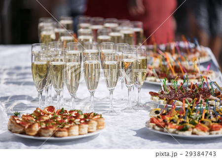 glasses with champagne. catering banquet table. a 29384743