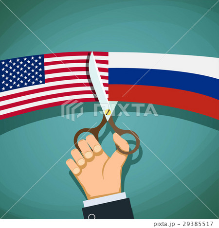 USA and Russian flags are cut with scissors. 29385517