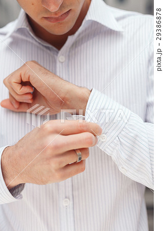 Close up of a hand businessman how wears white Close up of a hand businessman how wears white 29386878