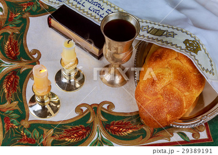 Shabbat candles in glass candlesticks with blurred 29389191