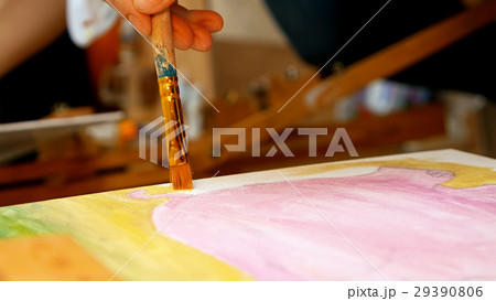 Artist paints picture artwork canvas in art studio Artist paints picture artwork canvas in art studio 29390806