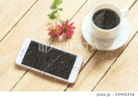 Smart phone and earphone with cup of coffee. 29400348