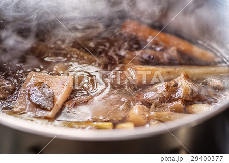 traditional beef broth with vegetable, bones traditional beef broth with vegetable, bones 29400377