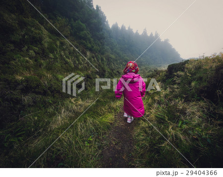 Girl on a mountain trail 29404366