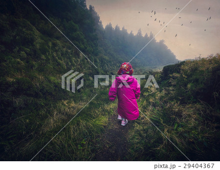 Girl on a mountain trail 29404367