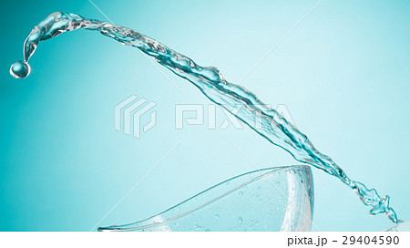 The water splashing to glass bowl on white 29404590