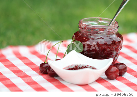 Jar of sweet cherry jam 29406556