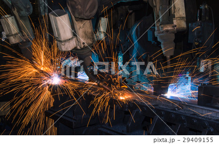 Team robot are welding in factory Team robot are welding in factory 29409155