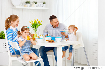 Happy family  at breakfast 29409923