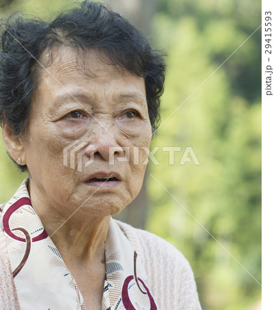 Upset Asian elderly woman Upset Asian elderly woman 29415593